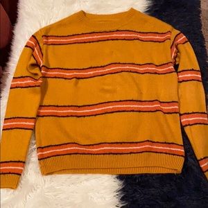 Orange white and black sweatshirt